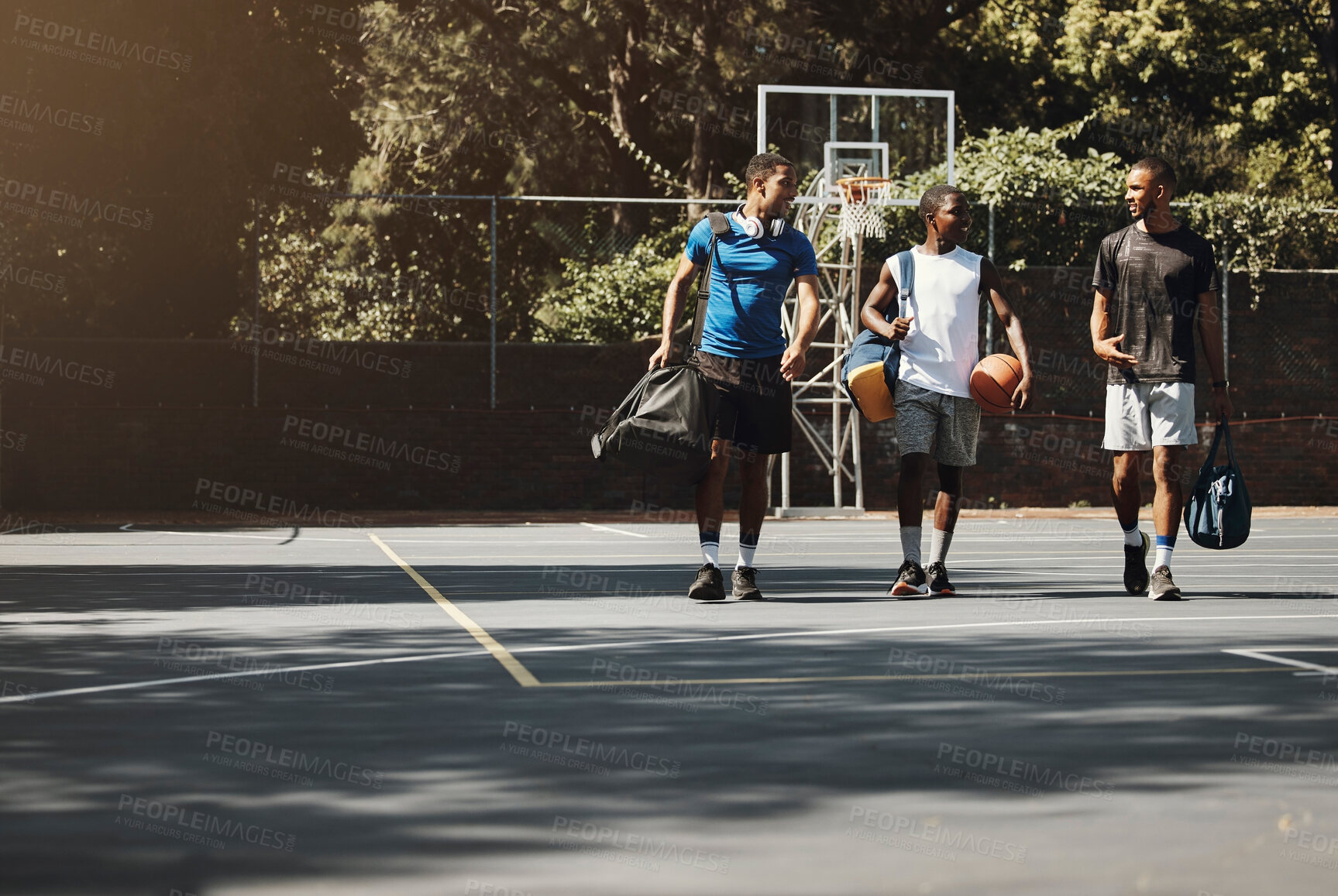 Buy stock photo Diversity, friends and sports on basketball court, training fitness exercise in New York and happy team talking. Healthy lifestyle club, group walking together and motivation for fun competition game