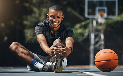 Buy stock photo Training, basketball player and man stretching legs in outdoor community court, muscle energy and healthy sports game performance. Happy, strong and young male athlete warm up exercise in competition