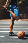 Fitness, basketball and man stretching legs on outdoor court for muscle preparation with workout. Muscular, strong and athlete male with standing warm up for sports game training exercise.

