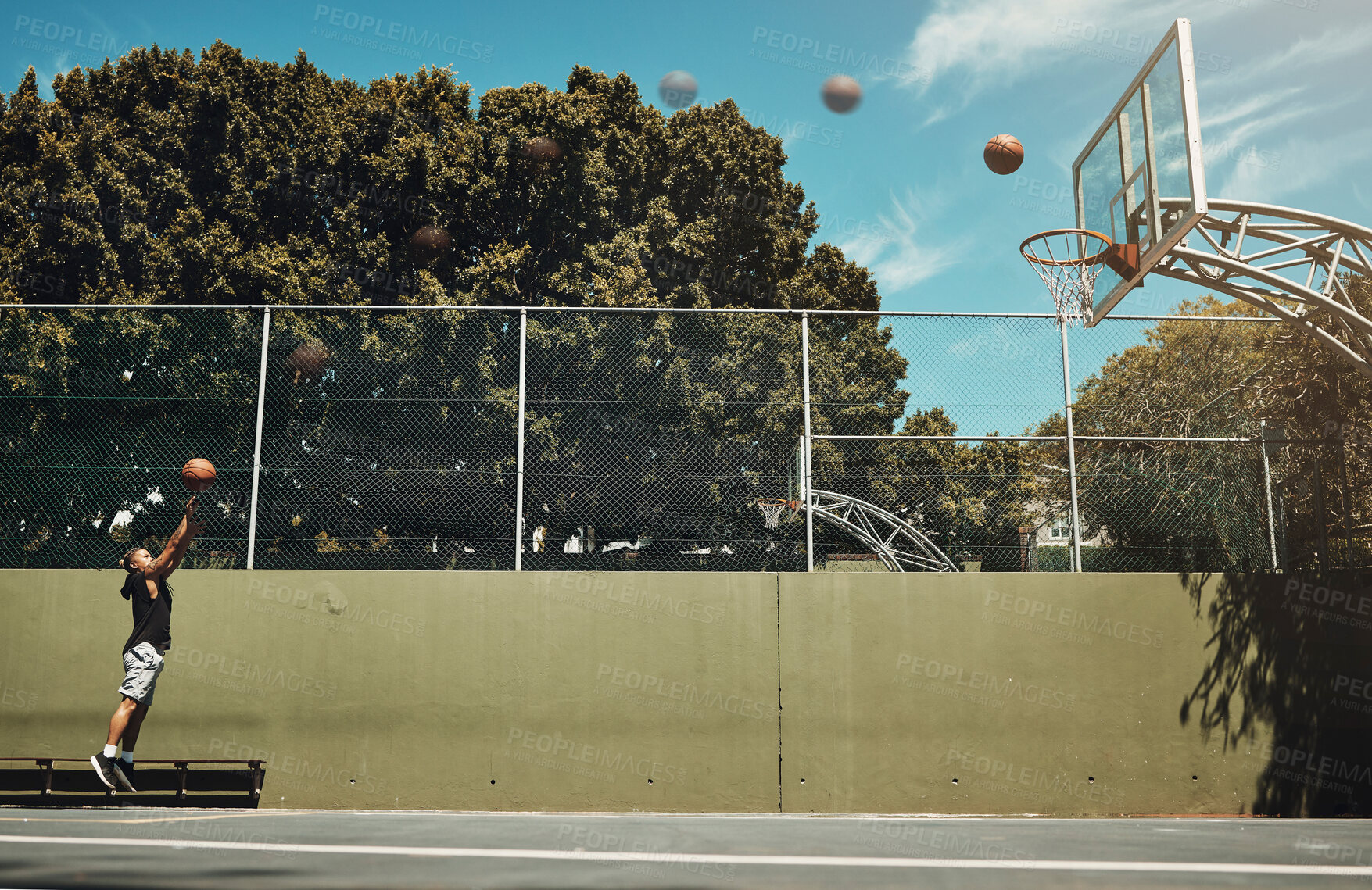 Buy stock photo Basketball, sports and net with a man athlete playing on a court for training, fitness or exercise. Healyh, wellness and workout with a male player practicing his shot to score for a game or match