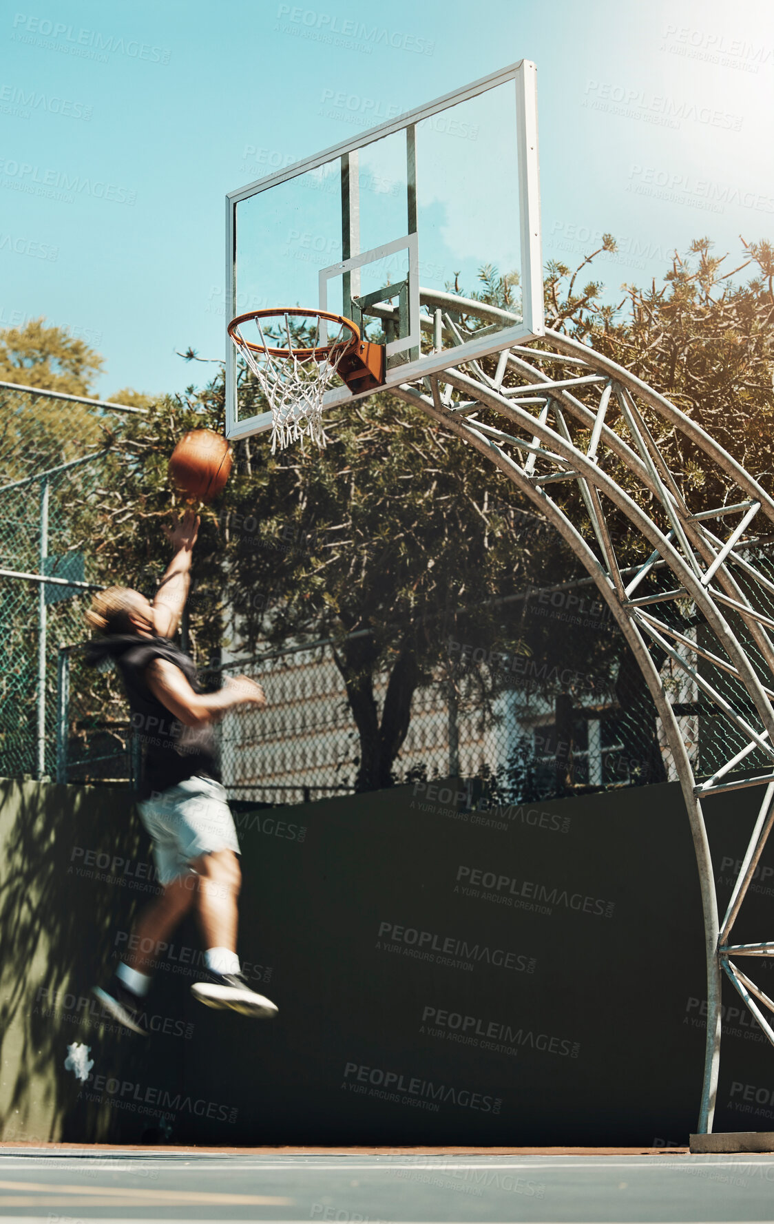 Buy stock photo Jumping man, basketball court and scoring goals in fitness workout, training or exercise for health, wellness or professional competition. Sports, energy and player in slam dunk winner game and match