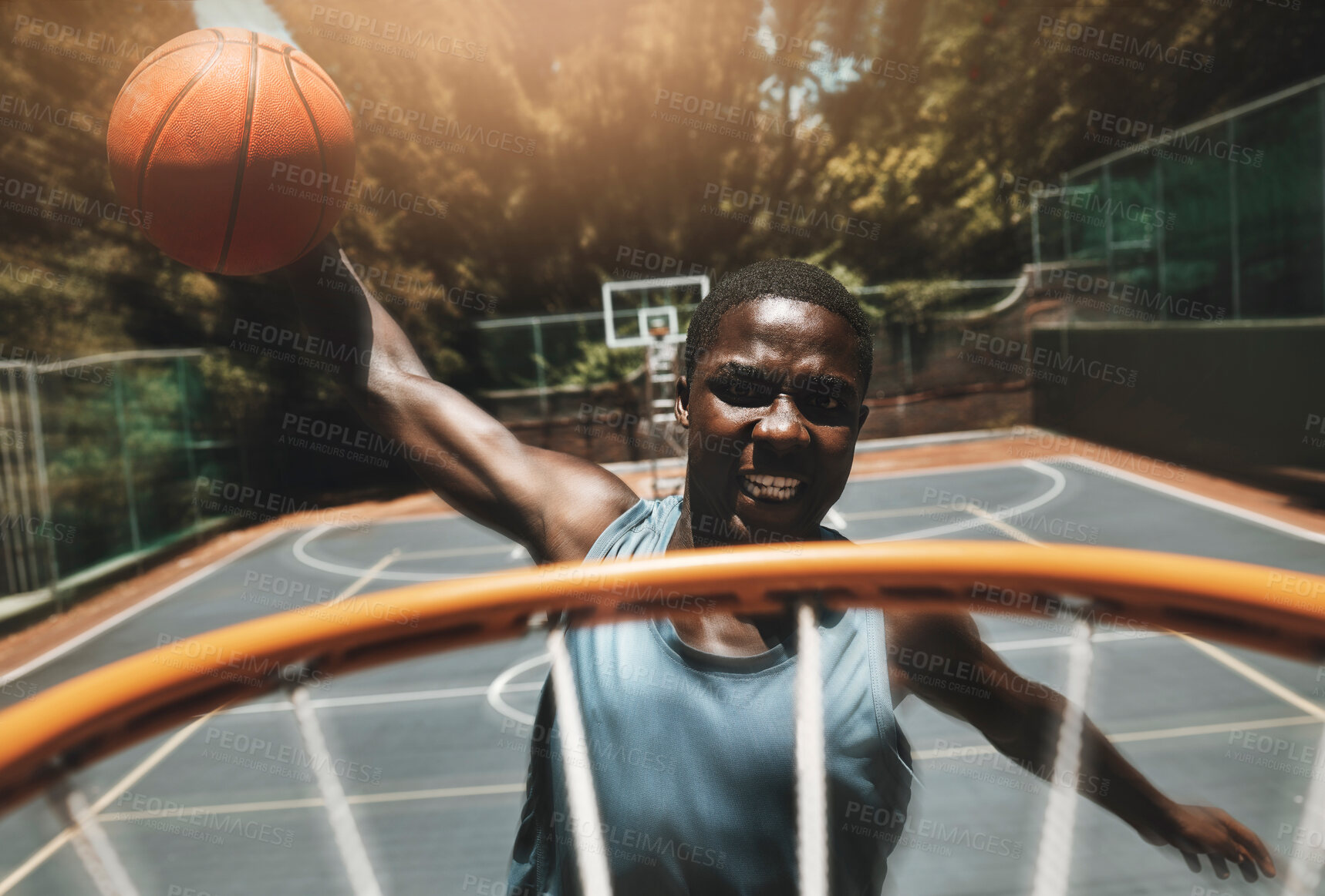 Buy stock photo Basketball, sports goal and man training at basketball court with ball, jump and dunk skill practice. Energy, fitness and power by athletic black man focused on winning target during exercise workout