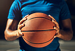 Hands, basketball and sports man ready for outdoor match game training with athletic grip closeup. Fitness, exercise and athlete male holding ball prepared to practice for competition macro.

