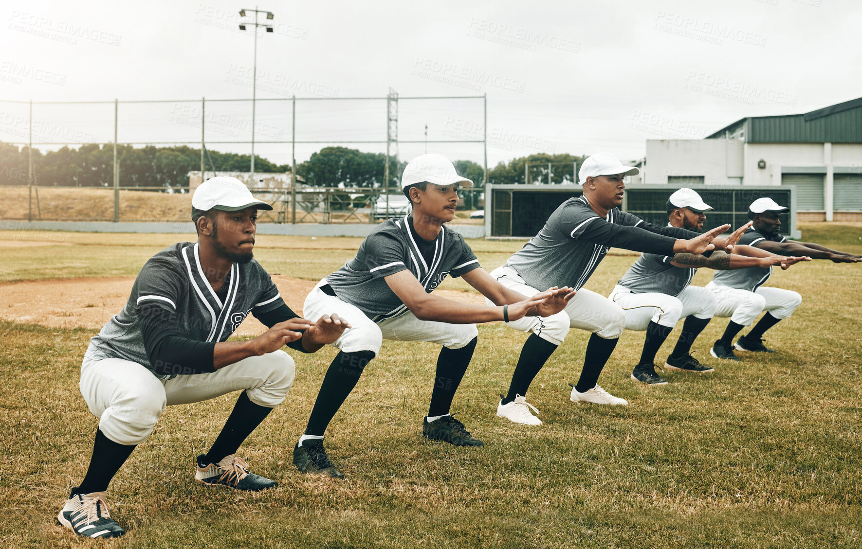 Buy stock photo Sports, baseball and team stretching in training, exercise and fitness workout on a baseball field in Houston, USA. Teamwork, softball and healthy group of men ready to start playing a match game 