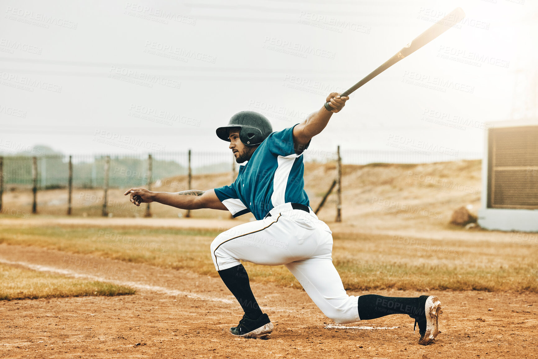 Buy stock photo Baseball, sports and homerun with a man athlete or batter hitting and scoring during a game outdoor on a pitch. Sport, fitness and exercise with a male player on a field for training or a match