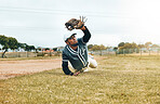 Baseball, sports and catch with a man athlete catching a ball during a game or match on a field for sport. Fitness, exercise and training with a male player playing in a competition on grass outdoor