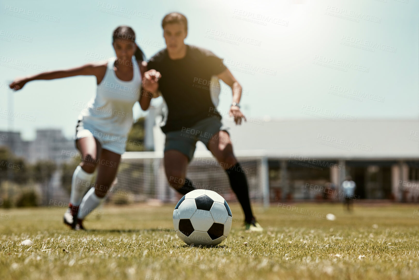 Buy stock photo Friends, soccer player and soccer training game on football field for fitness workout on grass outdoor football pitch for body or cardiovascular health. People, soccer ball and summer run in Brazil