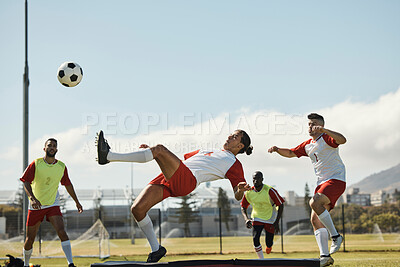 Buy stock photo Sports, soccer and soccer player with team and soccer ball in power kick while playing on soccer field. Energy, fitness and football with football players competing in training, exercise and practice