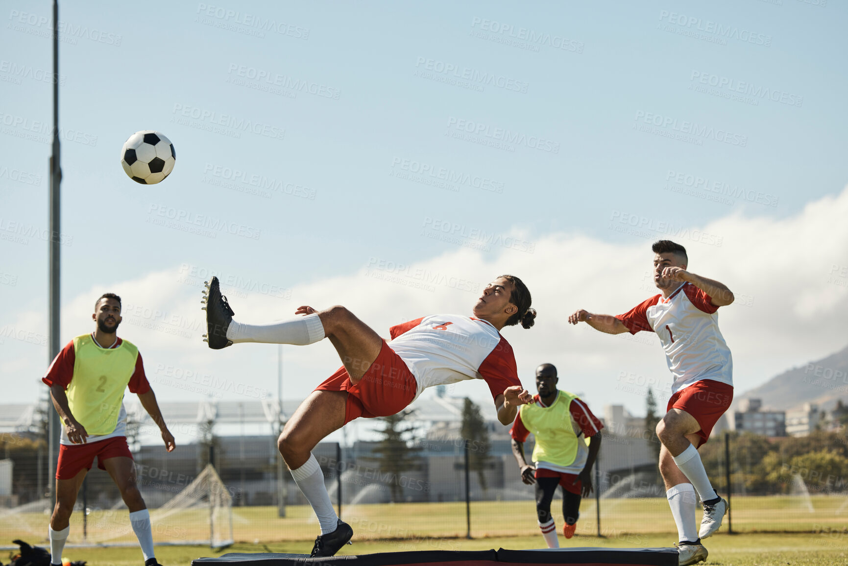 Buy stock photo Sports, soccer and soccer player with team and soccer ball in power kick while playing on soccer field. Energy, fitness and football with football players competing in training, exercise and practice