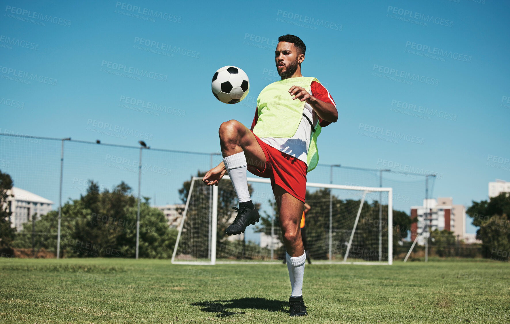 Buy stock photo Soccer, football game and black man player on a sports field with a match ball. Fitness, training exercise and health cardio of an athlete workout exercising with energy and motivation in nature