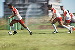 Soccer, team sports game and teamwork of men busy with football collaboration and workout. Fitness, training and healthy exercise of an healthy athlete ground with fast energy running with a ball