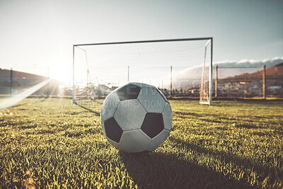 Buy stock photo Soccer ball, goal post and grass on sports field, wellness club or fitness center for exercise, training or Brazilian game. Zoom, texture and football for workout, stadium competition or energy match