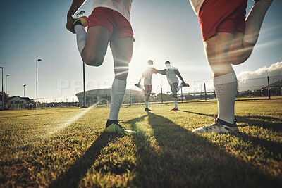 Buy stock photo Soccer, team and stretching together on sport field for exercise, wellness and workout practice for game day. Football, health and teamwork prepare for training, motivation and fitness before playing