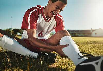 Buy stock photo Man, soccer and sport leg injury suffering in pain, agony and discomfort during training match or game on the field. Male football player screaming holding painful area in sports accident on grass