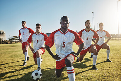 Buy stock photo Soccer, men and team stretching on field before sports game or training exercise. Health, fitness and teamwork, football competition players stretch on grass together for strong performance in match.