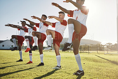 Buy stock photo Soccer, team and stretching together on sport field for practice, exercise and wellness jump workout for game day. Football, health or teamwork prepare for training, motivation or fitness for match


