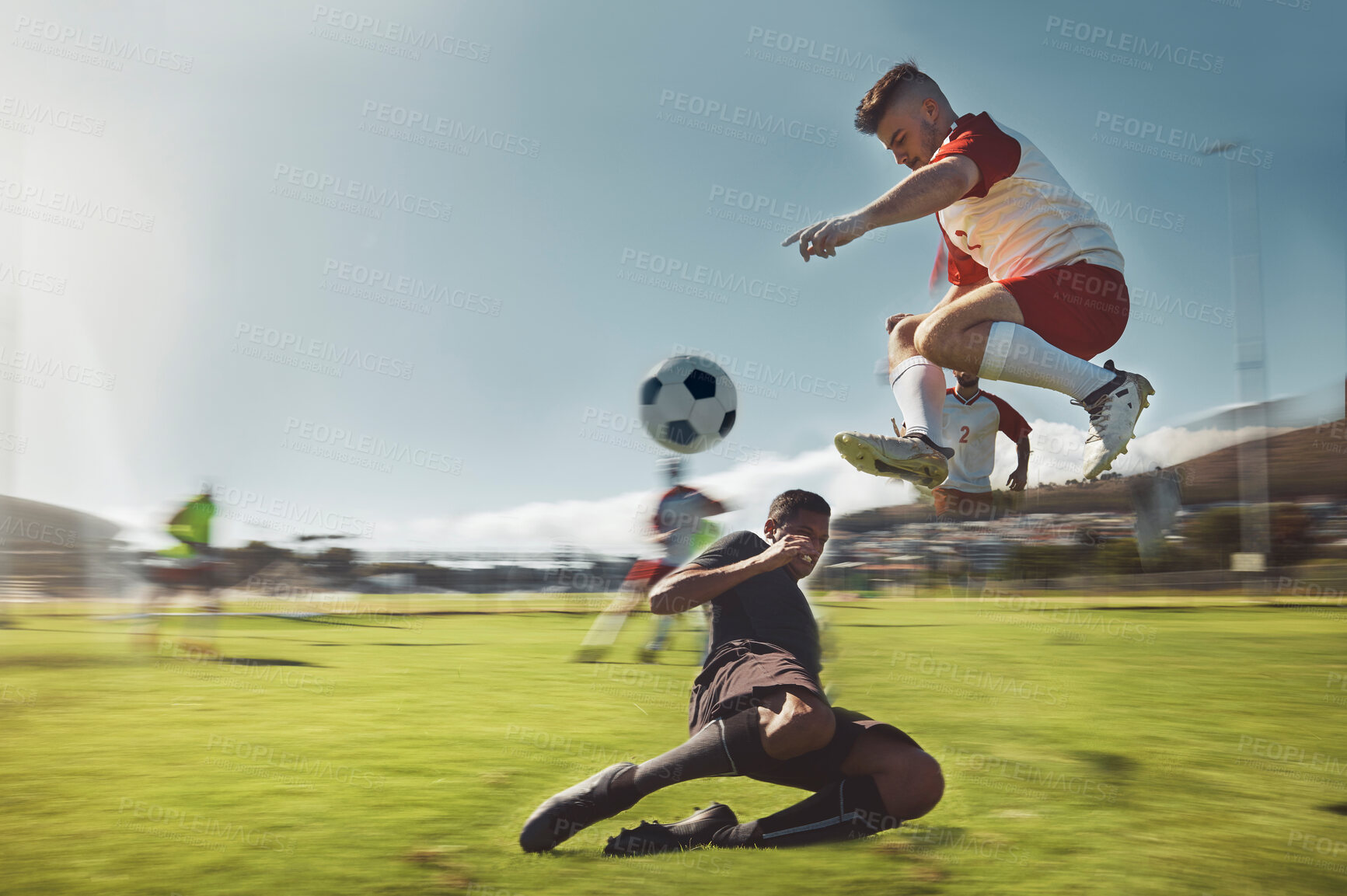 Buy stock photo Slide challenge, ball and soccer speed in game with men team on a grass field with sport man together. Football, fitness and sports people with strong, fast and competition in exercise or training
