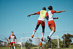 Soccer players, jumping and soccer field team playing competitive sports with energy, passion and power. Fitness, sport and football players training on a field for speed, endurance and goal practice