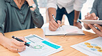 Business, group and hands for data on chart, analytics and graph for analytics in finance on desk. Teamwork, meeting and writing on document for financial strategy, planning and economy of market