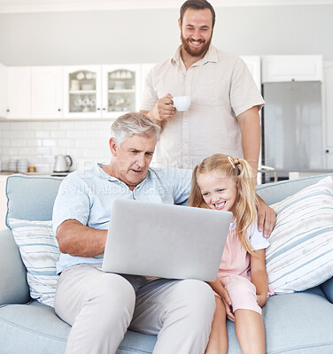 Buy stock photo Family, laptop and girl relax with grandfather on sofa while father drinking coffee in the background, happy, cheerful and sweet. Love, happy family and online streaming by grandpa and child smiling
