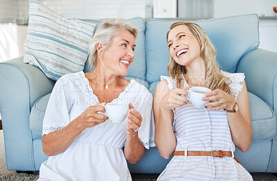 Buy stock photo Coffee, comic communication and mother with daughter on the living room floor of their house. Elderly woman speaking, giving advice and in conversation with her adult child with tea in the lounge