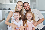 Love, big family and portrait smile on sofa relax in happiness for bonding and time together in home. Happy parents, couch and girl children care in comfort and relaxing on living room in house