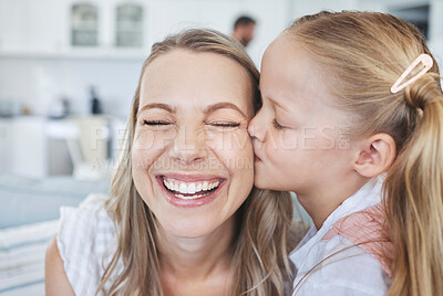 Buy stock photo Girl, mother and kiss on cheek for love, happiness and bonding together in family home. Woman, smile and child kissing on face for mothers day, birthday and happy in house with kid, care and time