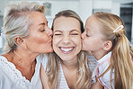 Kiss, child and grandmother with love for mother on mothers day in the living room of their house. Girl and senior woman kissing mom with affection, care and smile to show gratitude in their home