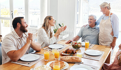 Buy stock photo Food, relax and happy with family at table for lunch, love and smile together in dining room. Eating, holiday and dinner for celebration with couple and parents for retirement, peace and lifestyle