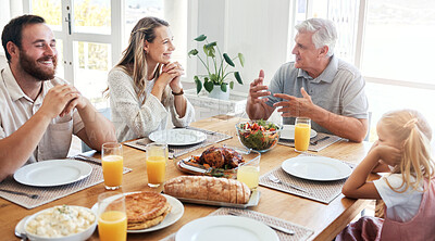 Buy stock photo Happy family, parents and old man with child for food, lunch or dinner gathering on holiday celebration at home. Smile, mother and grandfather talking and enjoying a conversation with girl and dad