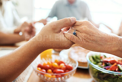 Buy stock photo Praying, holding hands and food of family at dining room table with faith, gratitude and christian lifestyle. Prayer together, trust and spiritual people with healthy lunch, brunch or holiday meal
