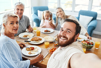 Buy stock photo Love, selfie and food with big family in home for cheerful photograph together in Australia. Parents, grandparents and child at lunch dining table with happy smile for picture memory in house.
