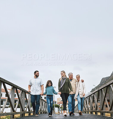 Buy stock photo Happy, nature and big family on an outdoor walk adventure while on a vacation in Canada together. Grandparents, parents and girl child with a smile walking on a spring journey or holiday at a resort.