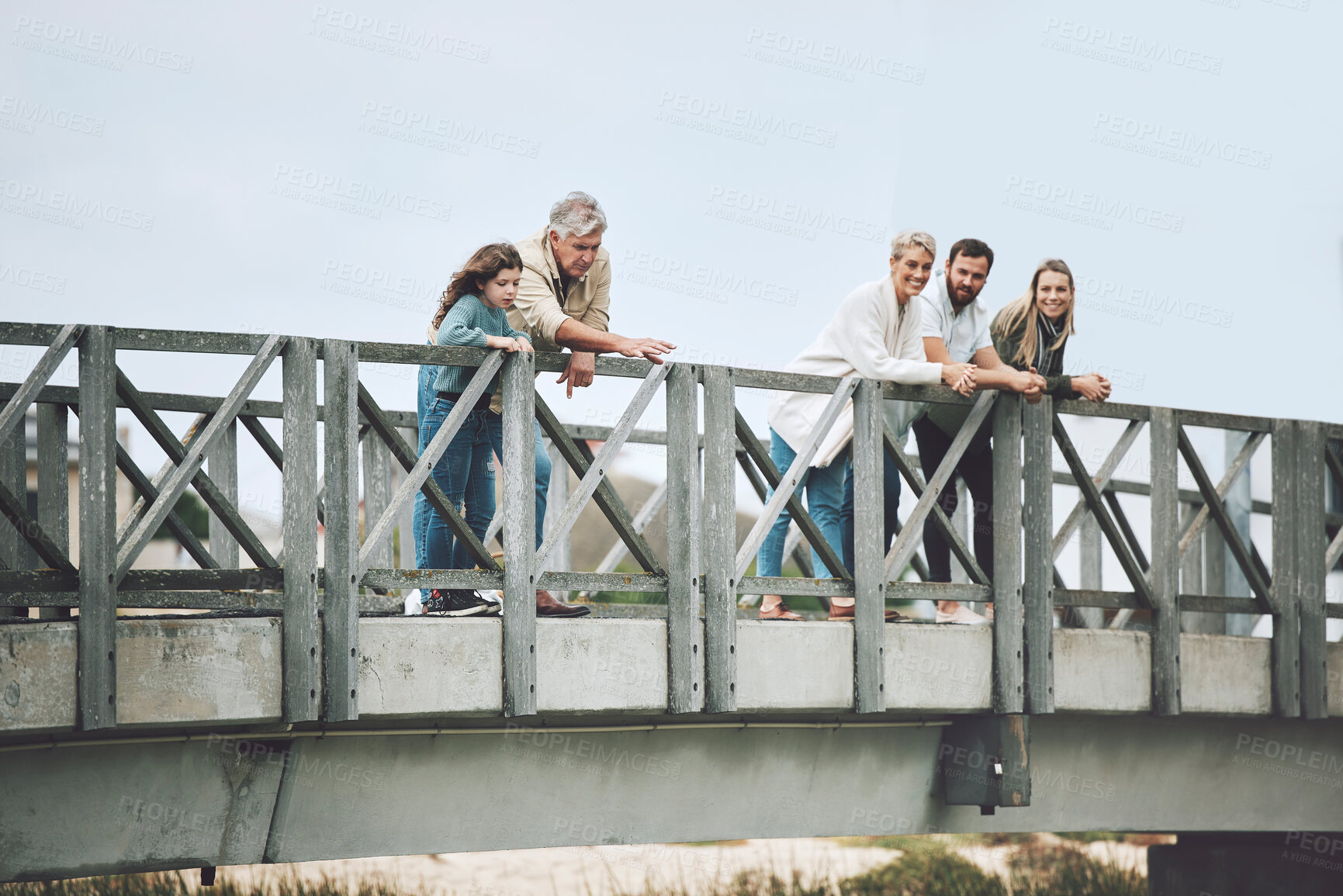 Buy stock photo Big family, bridge and happy travel, vacation or holiday trip together outdoors. Family, generations and mom, dad and girl, grandma and grandpa spending time together, love and bonding in Canada.

