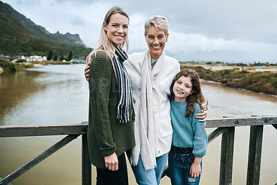 Buy stock photo Portrait of grandmother, mother and girl on bridge happy and enjoying family vacation, Travel, journey and adventure with parents, kid and grandparents standing by lake on holiday, travelling and joy