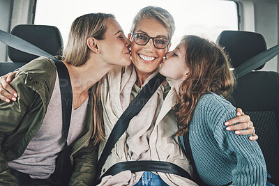 Buy stock photo Family, children and road trip with a girl, mother and grandmother kissing in the backset of a car. Mothers day, travel and transport with a senior woman, daughter and grandchild in a vehicle