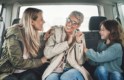 Buy stock photo Playful, mother and children on a road trip in a car for travel, adventure and holiday together. Grandmother, mom and girl kid playing, bonding and happy with a smile on vacation with transportation