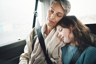 Buy stock photo Woman and girl in car sleeping during road trip, journey or drive for travel, vacation or holiday. Grandmother, child and sleep in van, vehicle or transportation for rest together as family