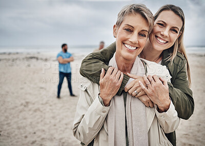 Buy stock photo Mother, daughter and hug, travel at beach and happy bonding during vacation and adventure, love and together in portrait. Women, senior and young, family at seaside and spending quality time.