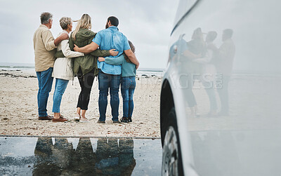 Buy stock photo Travel, love and big family hug at ocean for bonding experience on road trip in Australia. Adventure, beach and drive for holiday break sightseeing with parents, grandparents and child.

