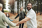 Happy, mother and father with family in forest enjoying quality bonding time together holding hands in nature. Hand of mom, dad and child with grandparents in love, support and care playing outside