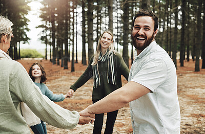 Buy stock photo Happy, mother and father playing in forest enjoying quality bonding time together holding hands in nature. Hand of mom, dad and child with grandparents in fun love, support and family care outdoors