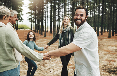 Buy stock photo Happy family, hands and dance in forest with girl, parents and grandparents dancing in a circle in nature. Family, kids and holding hands with cheerful excited and laughing people in a park together