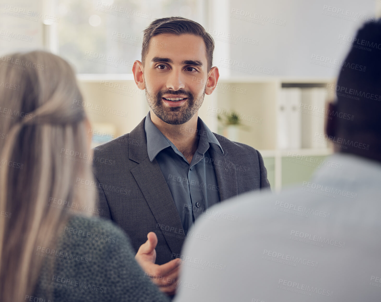 Buy stock photo Businessman, mentor and speaker in teamwork meeting, global collaboration and strategy planning in corporate office. Talking leader, worker and employee with company marketing ideas, target and goals