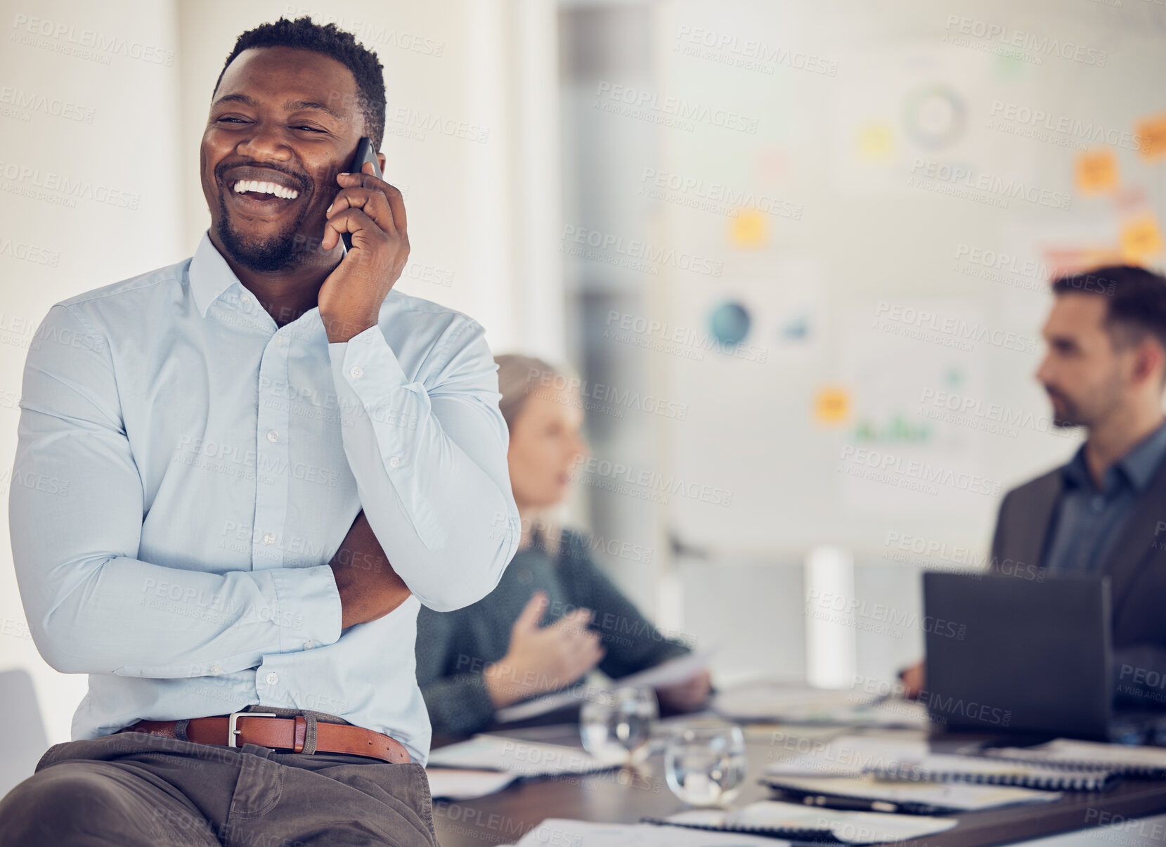 Buy stock photo Black man, meeting and smartphone for call, planning and doing strategy for startup company brainstorming at desk. Business male, entrepreneur and mobile conversation for collaboration and workplace