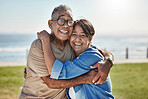 Senior couple, hug and happy on vacation being romantic, smile or bonding to celebrate marriage, anniversary or beach. Elderly man, mature woman or embrace for relationship, relax or romantic travel 