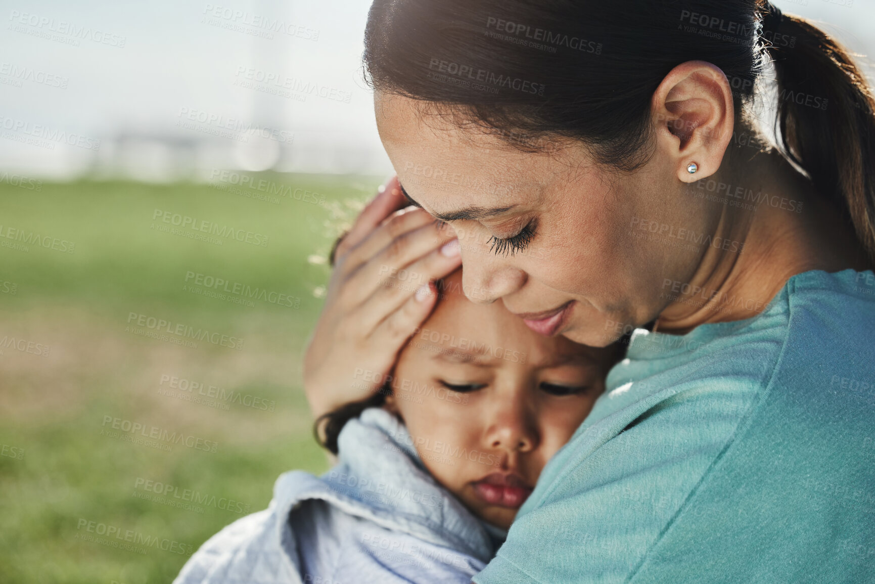 Buy stock photo Comfort, mother and sad baby with anxiety, fear and frustrated with problems being supported and loved by mom. Family, grief and mama carrying a moody and angry girl child or kid at a park outdoors 