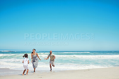 Buy stock photo Beach, running and happy family with child with tropical sea, island holiday or travel vacation blue sky mock up advertising. Healthy, energy and bond of mother, father and girl kid on sand and ocean