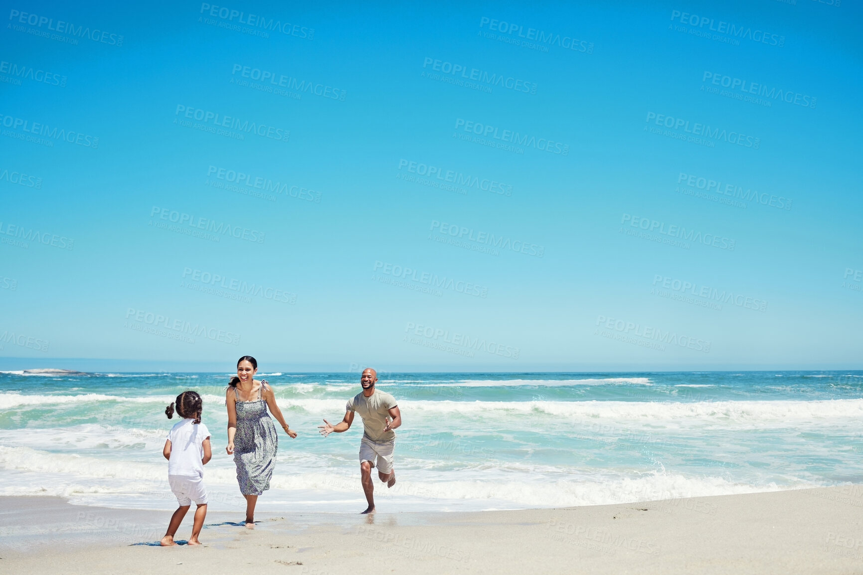 Buy stock photo Beach, running and happy family with child with tropical sea, island holiday or travel vacation blue sky mock up advertising. Healthy, energy and bond of mother, father and girl kid on sand and ocean