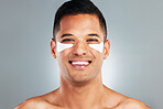 Happy, beauty and eye patches on a grey studio background. Skincare, health and man model with face and facial cosmetics strip or collagen pads for skin wellness, hydration or facial anti aging